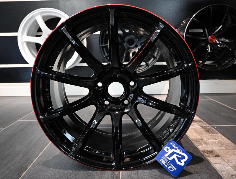 Glossy black and red RAYS Gram Lights 57Transcend Rev Limit multi-spoke alloy wheel for Miata
