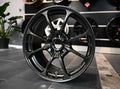 20-inch black forged Rays Volk NE24 multi-spoke alloy wheel