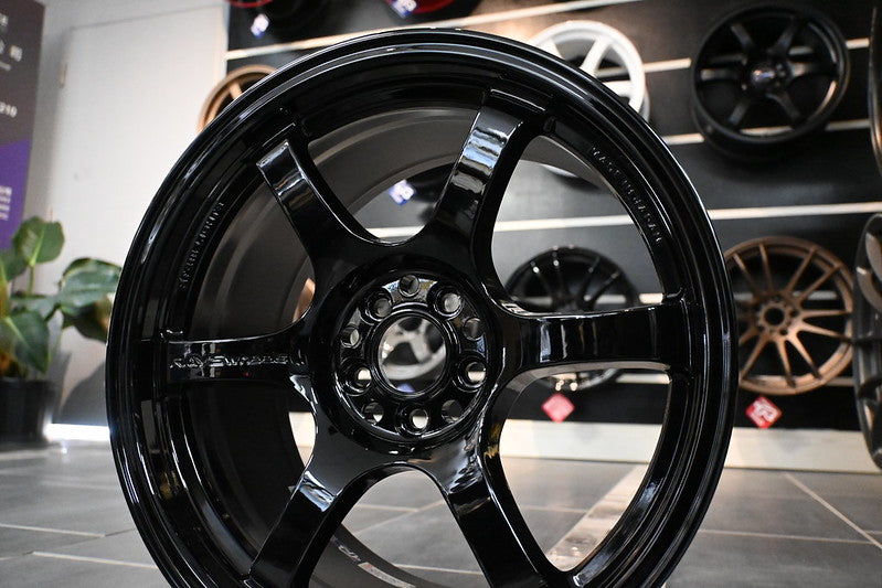 RAYS Gram Lights 57DR gloss black five-spoke wheel with silver logo