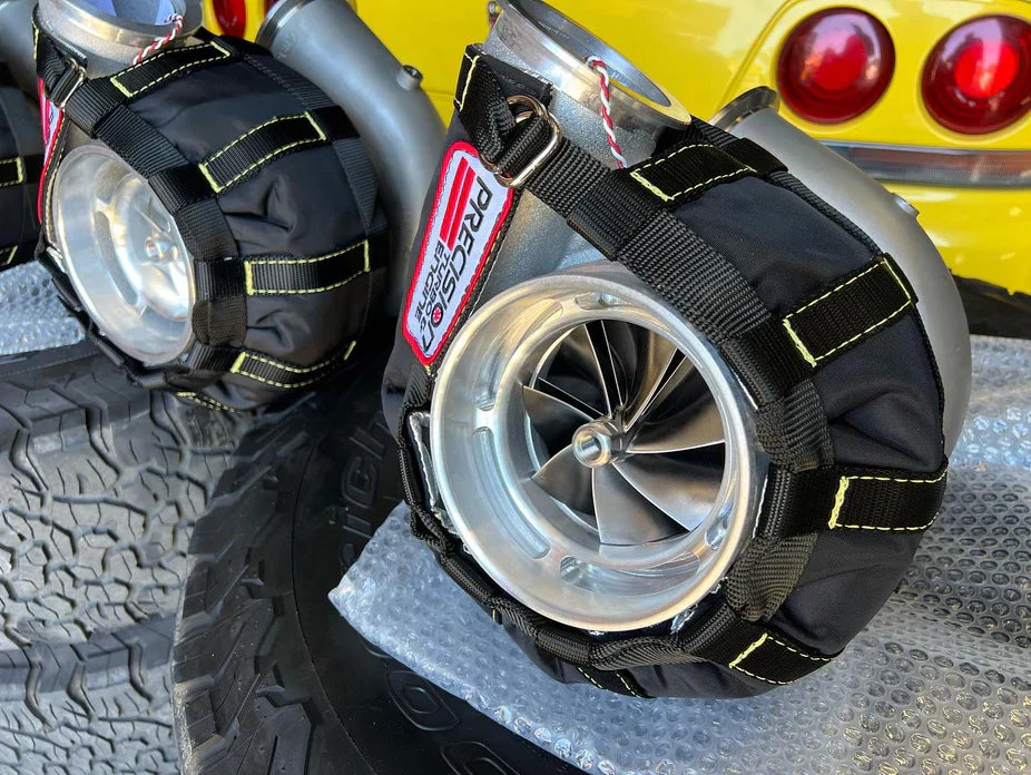 Black tire cover with silver accents for GEN2 Pro Mod 110 CEA turbocharger